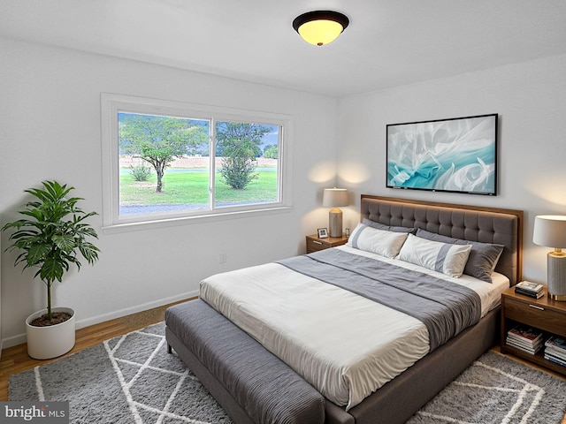 bedroom featuring hardwood / wood-style flooring