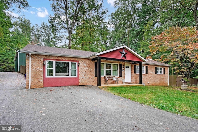 view of front of home with a front yard