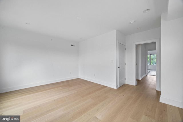 706 Latona St Unit F, Philadelphia, PA 19147 - spare room with light wood-style flooring, baseboards, and a smoke detector