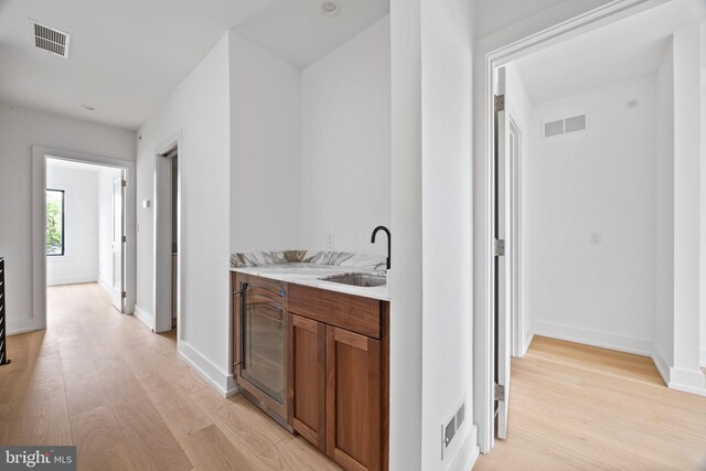 706 Latona St Unit F, Philadelphia, PA 19147 - corridor with a sink, light wood finished floors, and baseboards