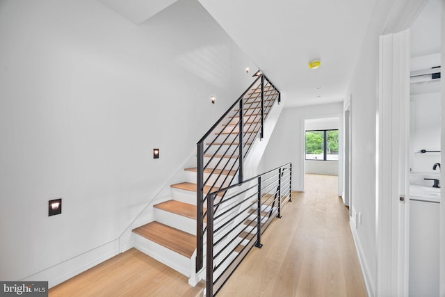 706 Latona St Unit F, Philadelphia, PA 19147 - stairway featuring wood finished floors and baseboards