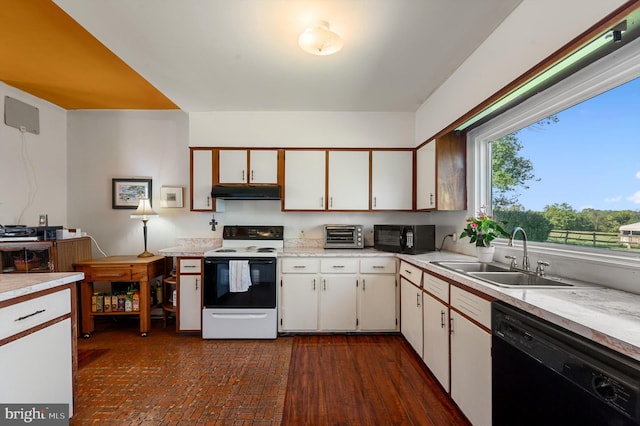 kitchen featuring white cabinetry, black appliances, and sink