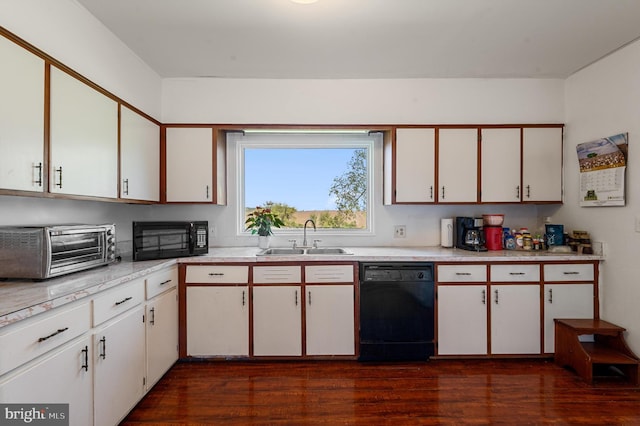 kitchen with sink, black appliances, dark hardwood / wood-style flooring, and white cabinets