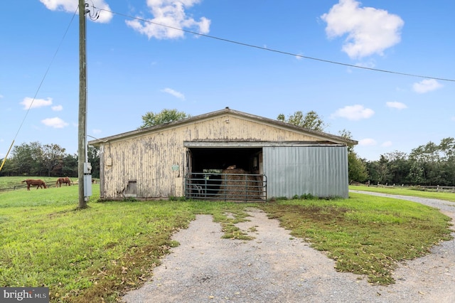 view of outdoor structure with a yard