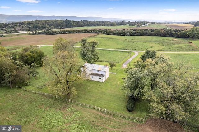 birds eye view of property with a rural view and a mountain view