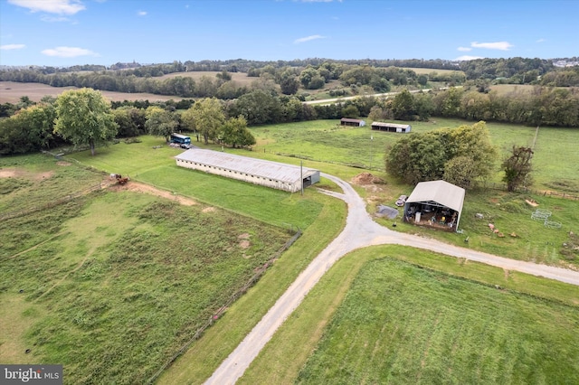 birds eye view of property featuring a rural view