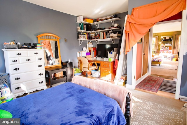 bedroom featuring light wood-type flooring