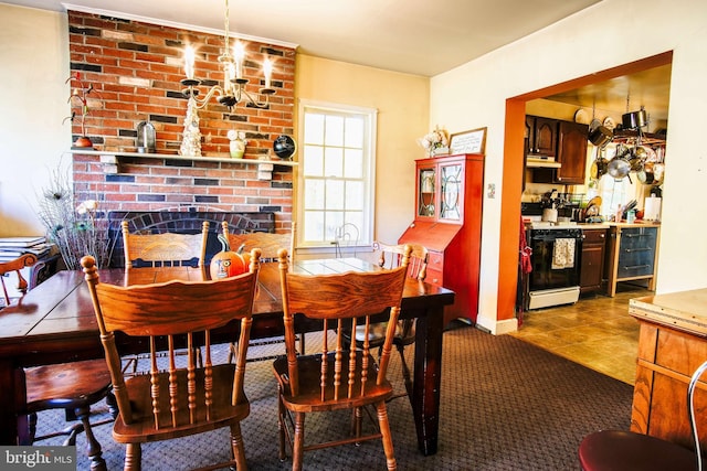 dining space with a brick fireplace