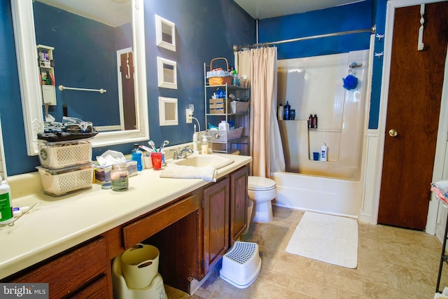 full bathroom with shower / bath combo, tile patterned flooring, toilet, and vanity