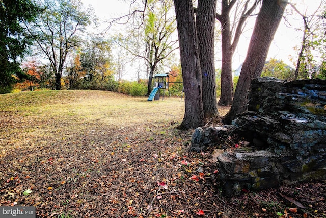 view of yard featuring a playground