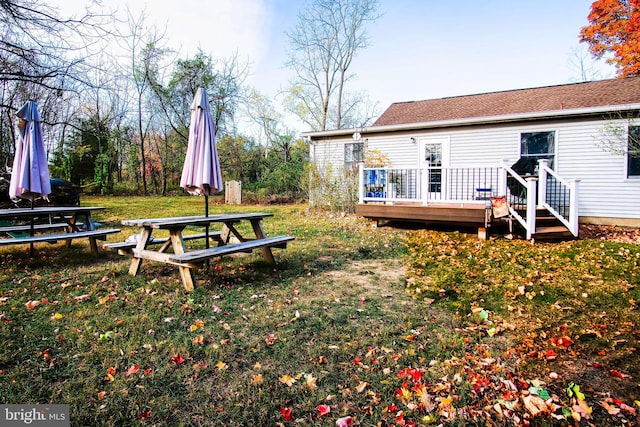 view of yard featuring a deck