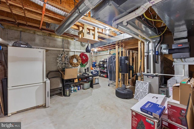 basement with white fridge