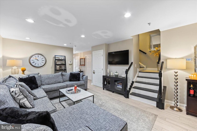 living room with light hardwood / wood-style floors