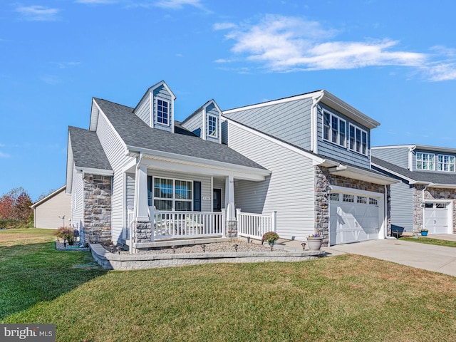 view of front facade featuring stone siding, a front lawn, roof with shingles, and covered porch