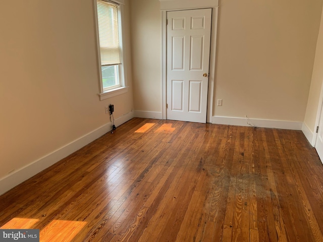 unfurnished bedroom featuring hardwood / wood-style floors