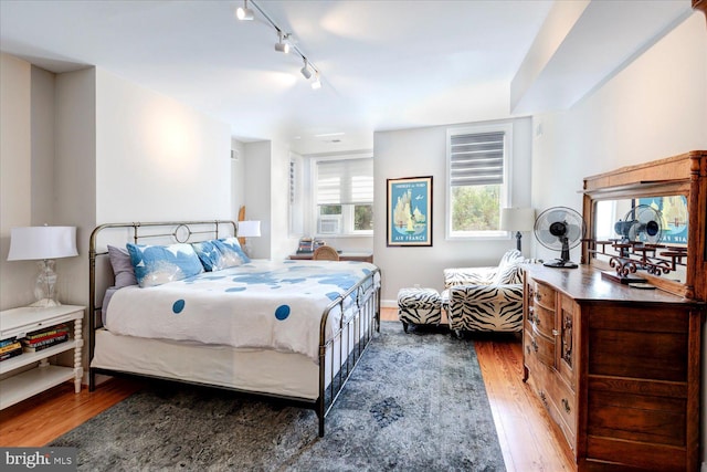 bedroom featuring dark wood-type flooring