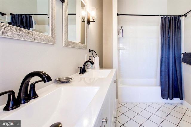 bathroom featuring vanity, tile patterned floors, and shower / tub combo