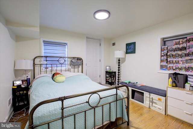 bedroom featuring light hardwood / wood-style floors