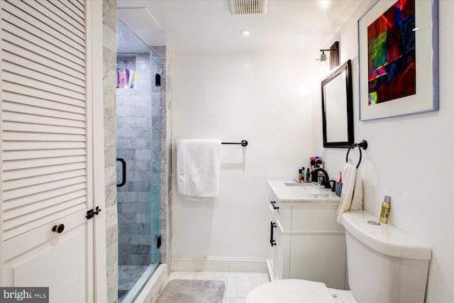 bathroom with walk in shower, tile patterned flooring, vanity, and toilet