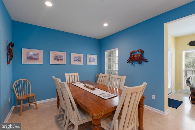 dining room featuring light tile patterned flooring