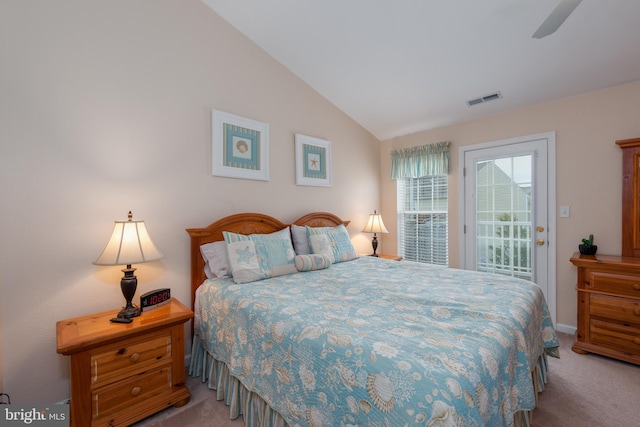 bedroom featuring access to outside, vaulted ceiling, carpet, and ceiling fan