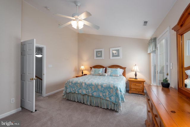 carpeted bedroom featuring lofted ceiling and ceiling fan