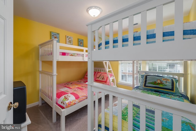 bedroom featuring carpet