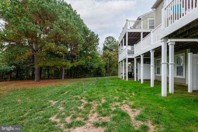 view of yard with a wooden deck