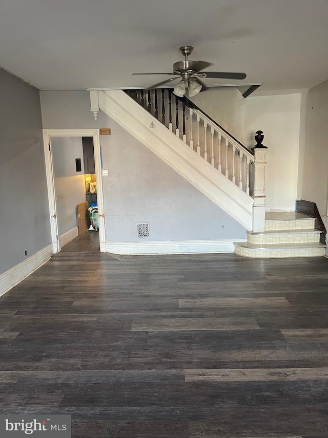 interior space featuring wood-type flooring and ceiling fan