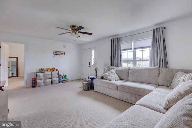 living room with light carpet and ceiling fan