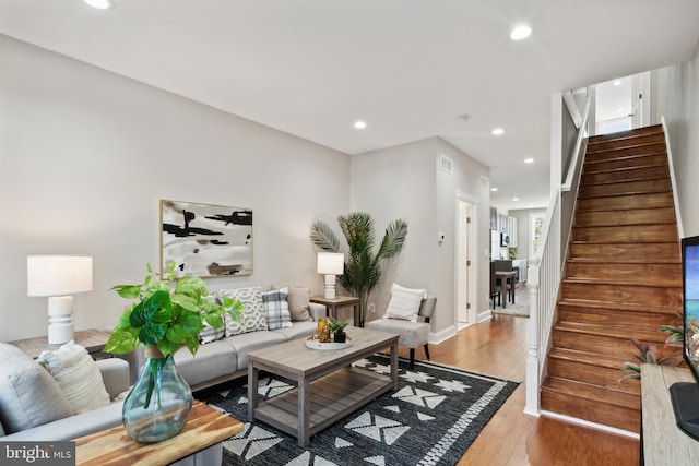 living room with hardwood / wood-style floors