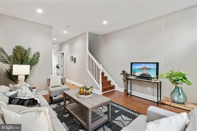 living room with dark wood-type flooring