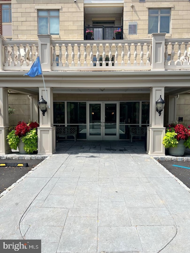 property entrance with a balcony