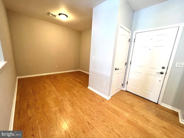 entrance foyer with light hardwood / wood-style flooring