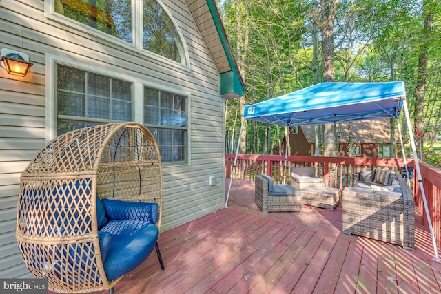 wooden deck featuring an outdoor hangout area