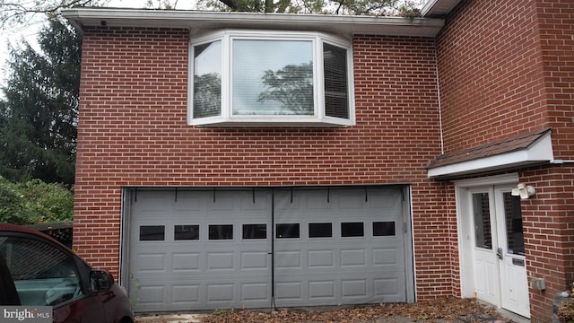 view of property exterior featuring a garage