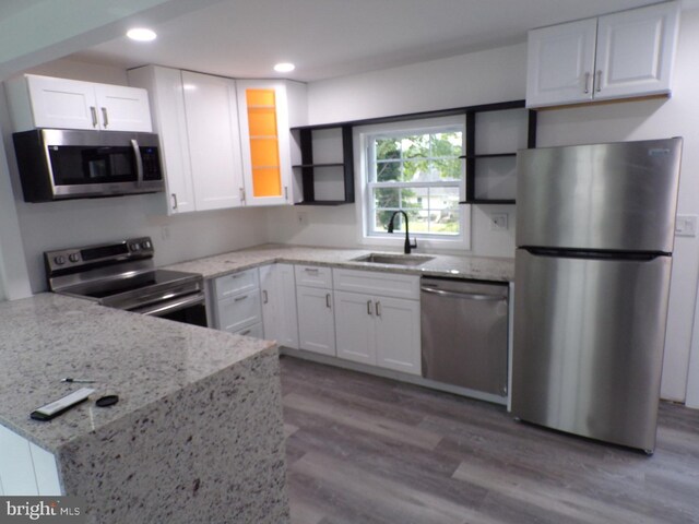 interior space featuring dark hardwood / wood-style floors and sink