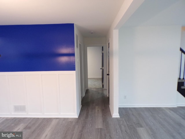 hallway featuring hardwood / wood-style floors