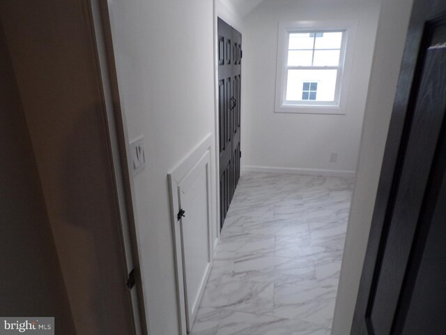 unfurnished room with dark wood-type flooring