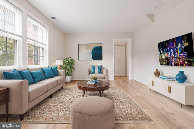 living room featuring light wood-type flooring