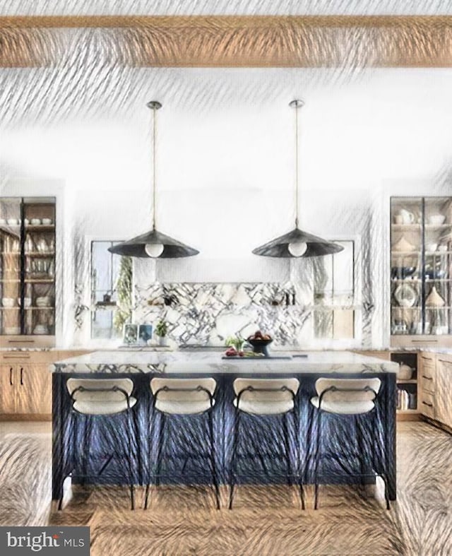 kitchen featuring hanging light fixtures and tasteful backsplash