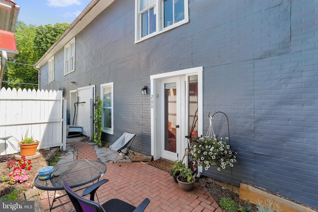 rear view of house featuring a patio