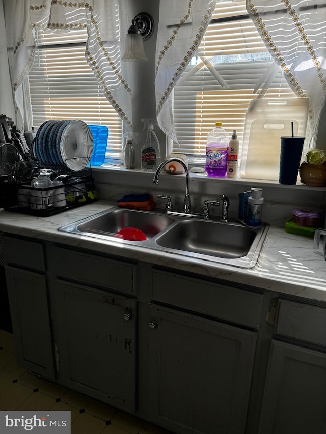 313 W Wood St, Vineland, NJ 08360 - kitchen featuring light countertops and a sink