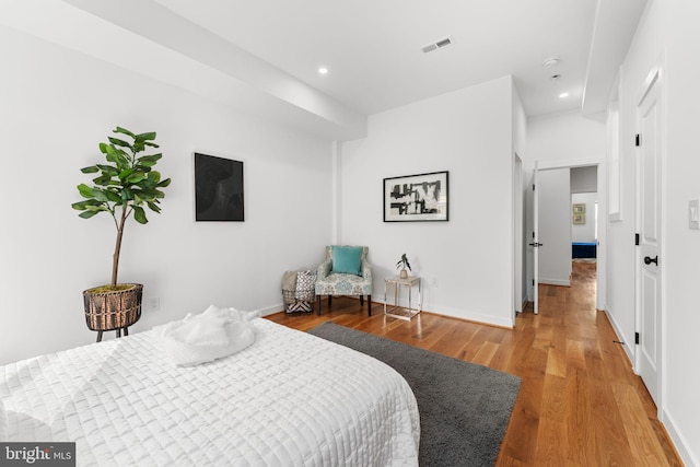 bedroom featuring hardwood / wood-style flooring