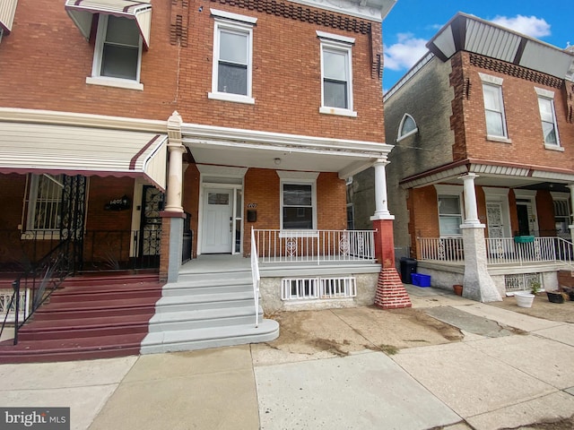 multi unit property featuring covered porch