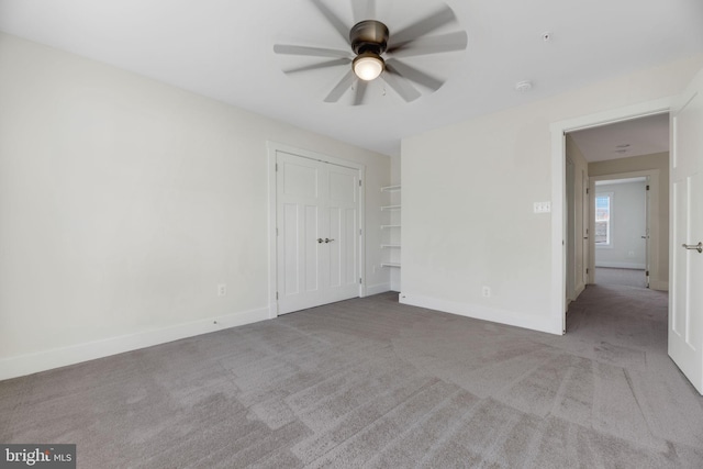 unfurnished bedroom featuring carpet flooring and ceiling fan