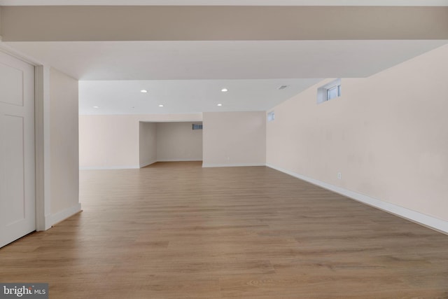 spare room featuring light hardwood / wood-style flooring