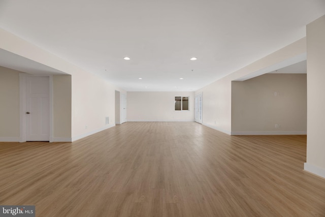 unfurnished room featuring light hardwood / wood-style flooring