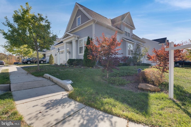 view of home's exterior with a yard