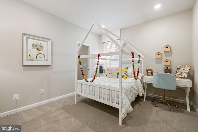 bedroom featuring carpet